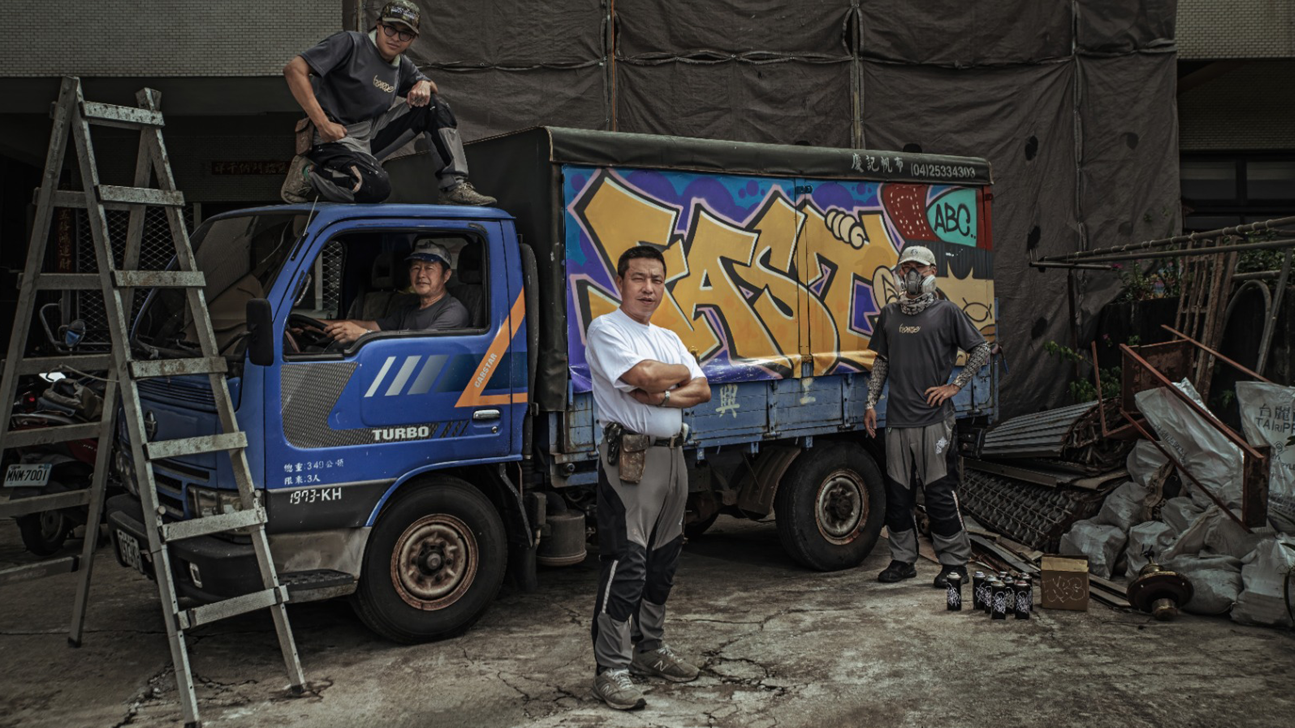 TMS.SITE logo placement: this small Taiwanese construction team is seen wearing their TMS.SITE workwear with custom logo placement