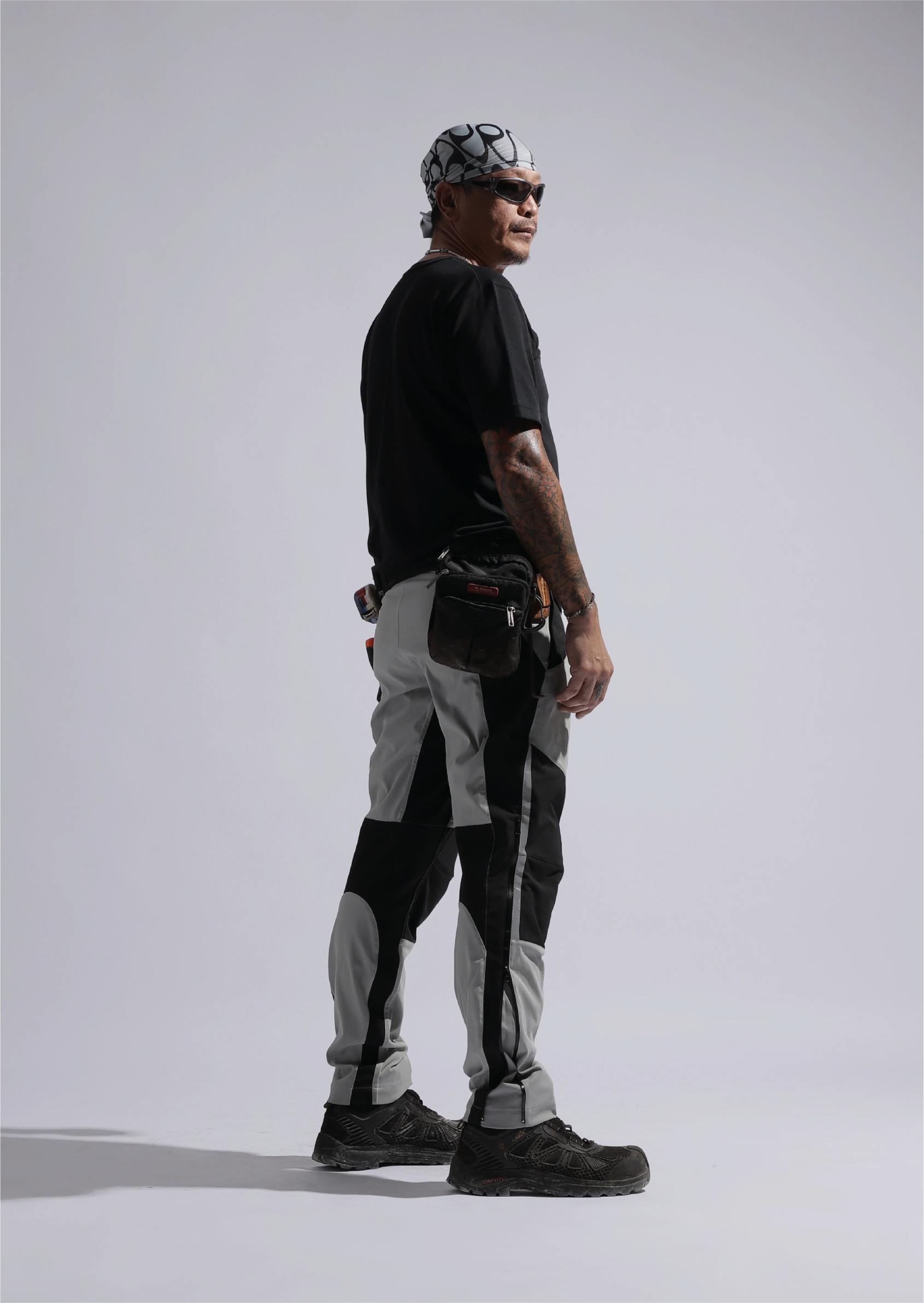 TMS.SITE press: The New Order, June 2022, showcasing TMS.SITE workwear through a man wearing the apparel
